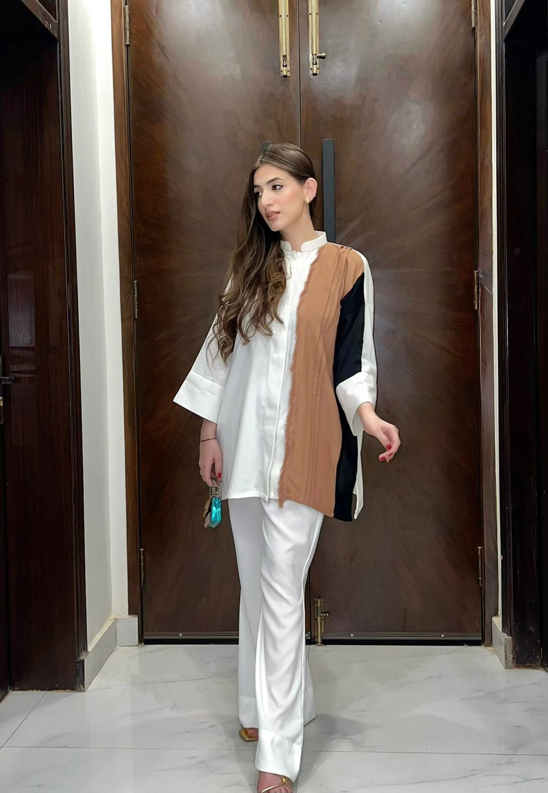 Shop online Pakistani clothes
White and brown Co-ord set with fringes,branded clothes by Manahils offering white co-ord set with fringes ,best online clothing brand in Pakistan,women clothing, designer wear clothes,ready to wear,ready made clothes  